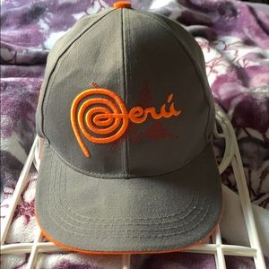 Gray and orange baseball cap